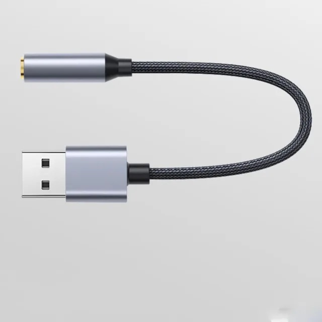 USB till Aux-ljudkortsadapter, Svart/Grå i gruppen DATORER & KRINGUTRUSTNING / Datortillbehör / Externa ljudkort hos TP E-commerce Nordic AB (38-84383)